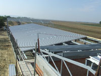 IRODA-, MŰHELY-, ÉS RAKTÁRÉPÜLET TOLNA 6-OS FŐÚT